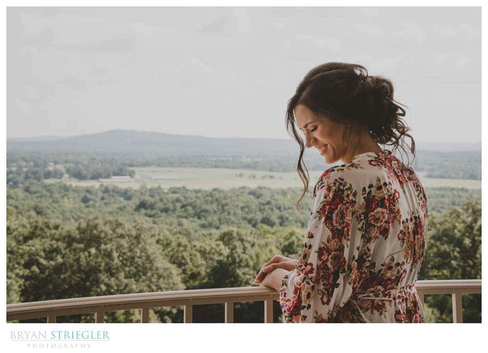 bride on balcony of Autumn's Ridge